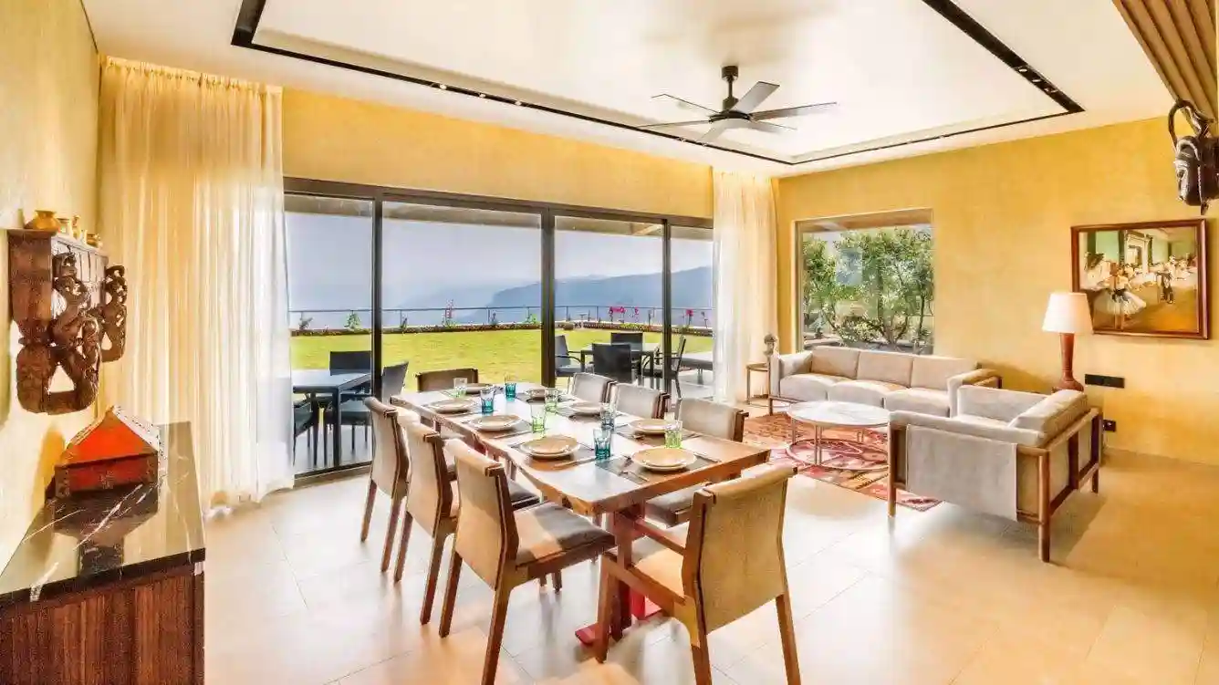 Living room with modern furnishings in Advait bungalow